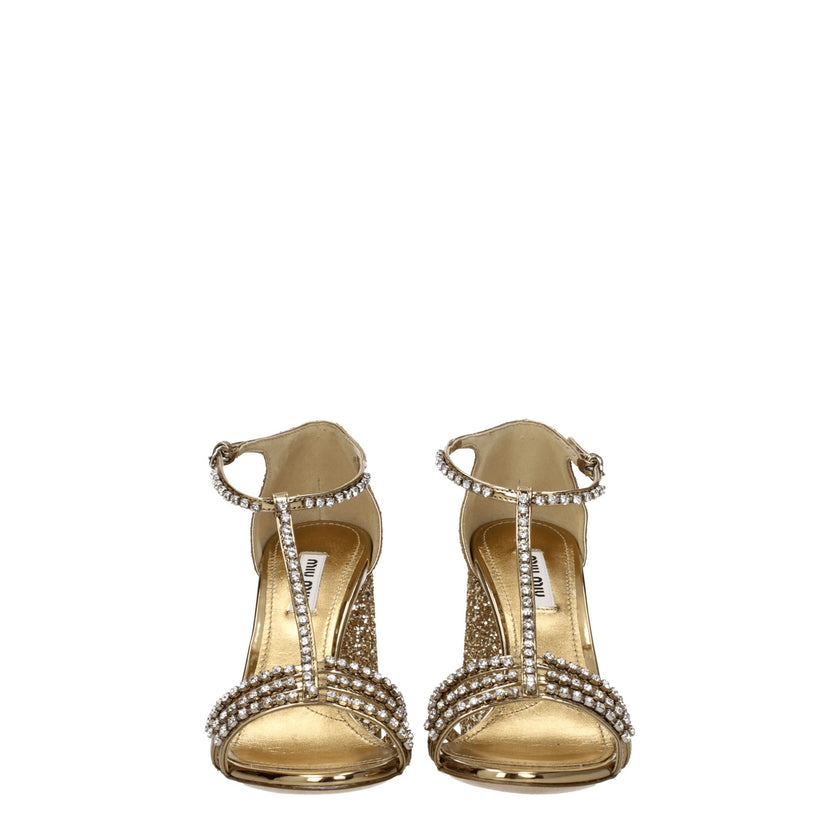 Gold Plastic Platform SandalsDescription: The product with MPN 5X732D3LKS100F0522 and code F76684 glitter in gold is a sandals designed by Miu Miu. It has features like rhinestone. Additional Info: Style: Stylish Closing type: Buckle Closure Materials: Le