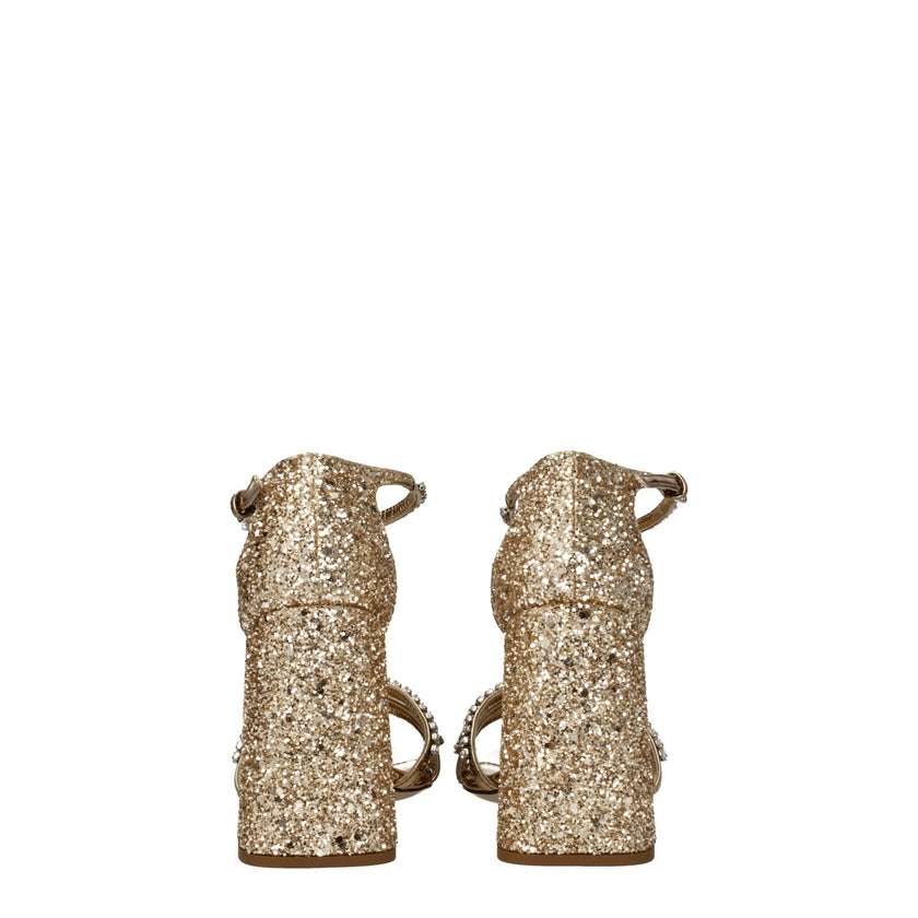 Gold Plastic Platform SandalsDescription: The product with MPN 5X732D3LKS100F0522 and code F76684 glitter in gold is a sandals designed by Miu Miu. It has features like rhinestone. Additional Info: Style: Stylish Closing type: Buckle Closure Materials: Le