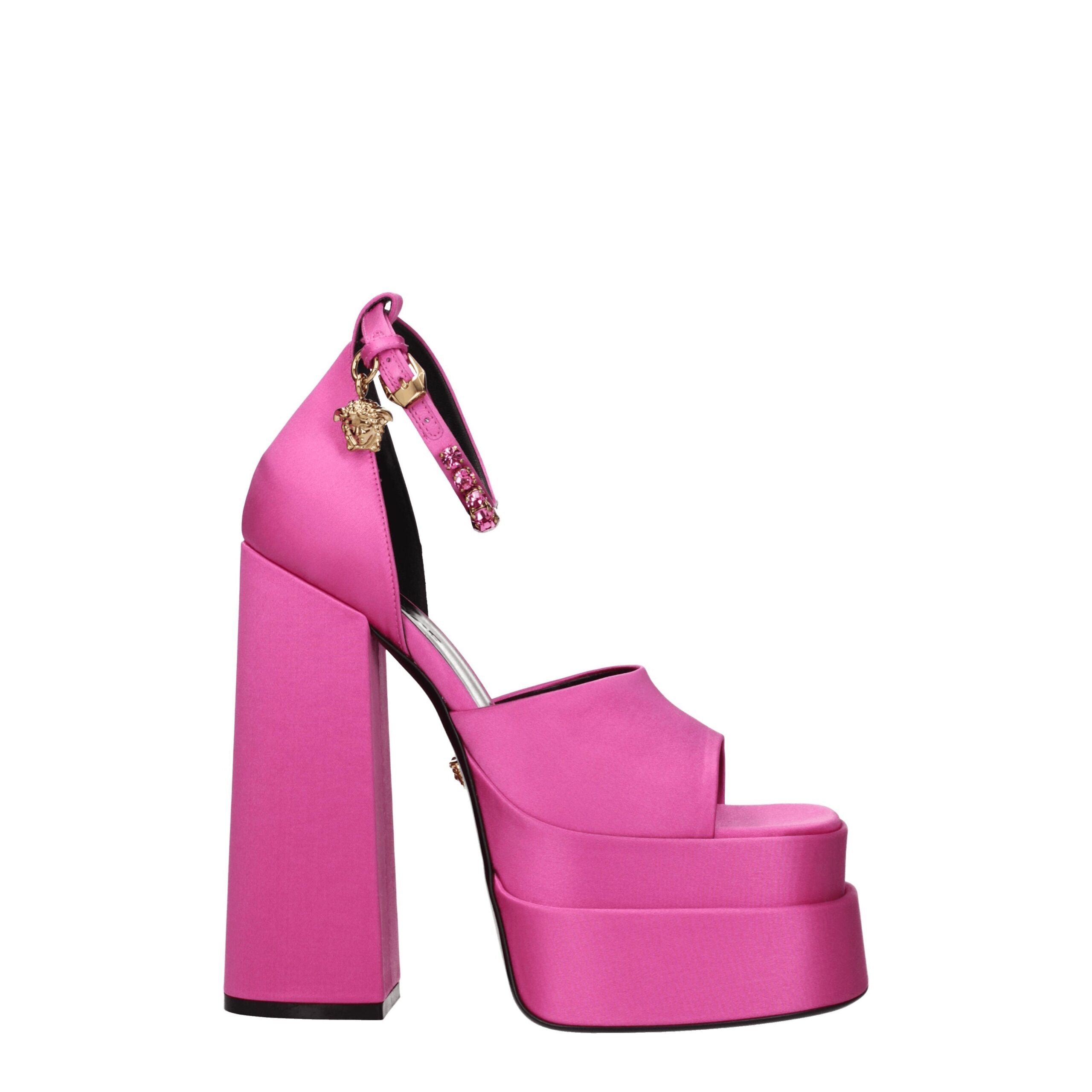 Pink Satin Platform SandalsDescription: The product with MPN 1007717DRA671PK4V and code F76783 satin in fuchsia is a sandals designed by Versace. It has features like side detail, rhinestone. Additional Info: Style: Casual Closing type: Buckle Closure Mat