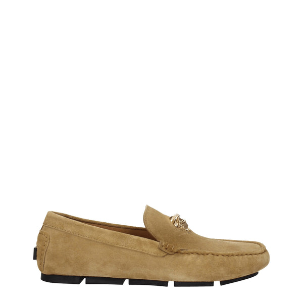 Beige Leather Slip-On LoafersDescription: The product with MPN 10037011A006341K78V and code F76790 suede in beige is a loafers designed by Versace. It has features like front logo. Additional Info: Color details: Gold Style: Casual Materials: Suede Shoe s