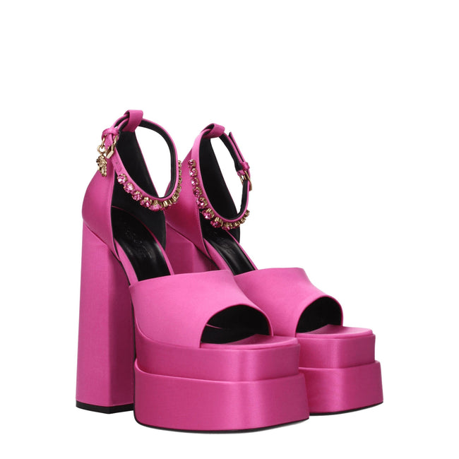 Pink Satin Platform SandalsDescription: The product with MPN 1007717DRA671PK4V and code F76783 satin in fuchsia is a sandals designed by Versace. It has features like side detail, rhinestone. Additional Info: Style: Casual Closing type: Buckle Closure Mat