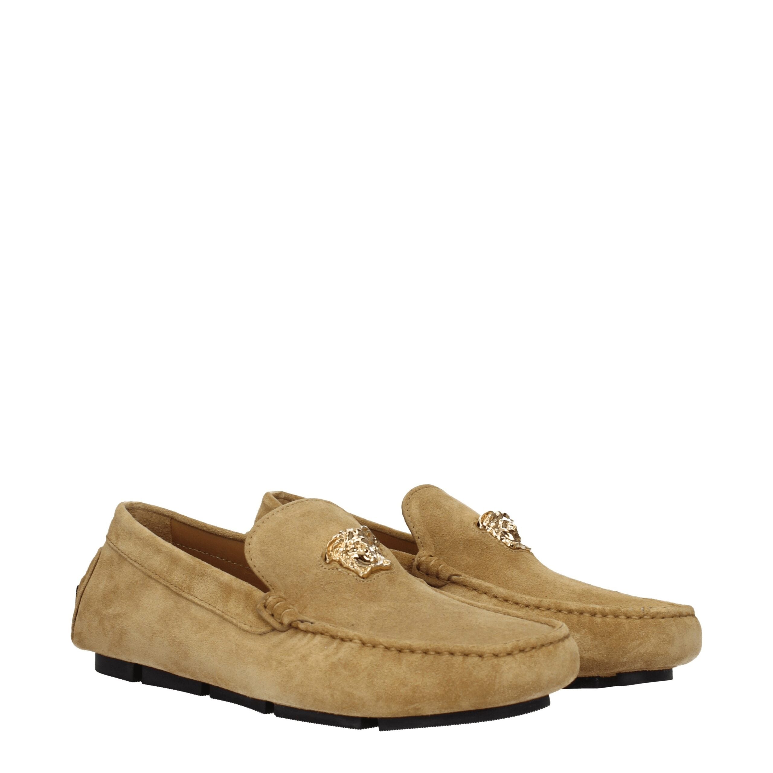 Beige Leather Slip-On LoafersDescription: The product with MPN 10037011A006341K78V and code F76790 suede in beige is a loafers designed by Versace. It has features like front logo. Additional Info: Color details: Gold Style: Casual Materials: Suede Shoe s