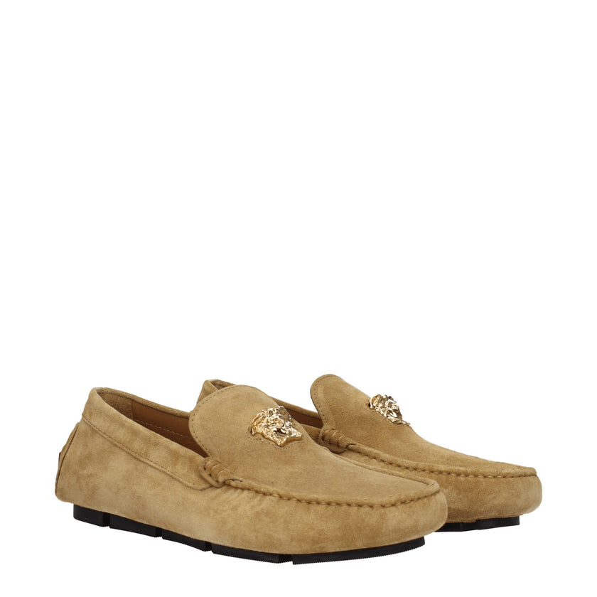 Beige Leather Slip-On LoafersDescription: The product with MPN 10037011A006341K78V and code F76790 suede in beige is a loafers designed by Versace. It has features like front logo. Additional Info: Color details: Gold Style: Casual Materials: Suede Shoe s