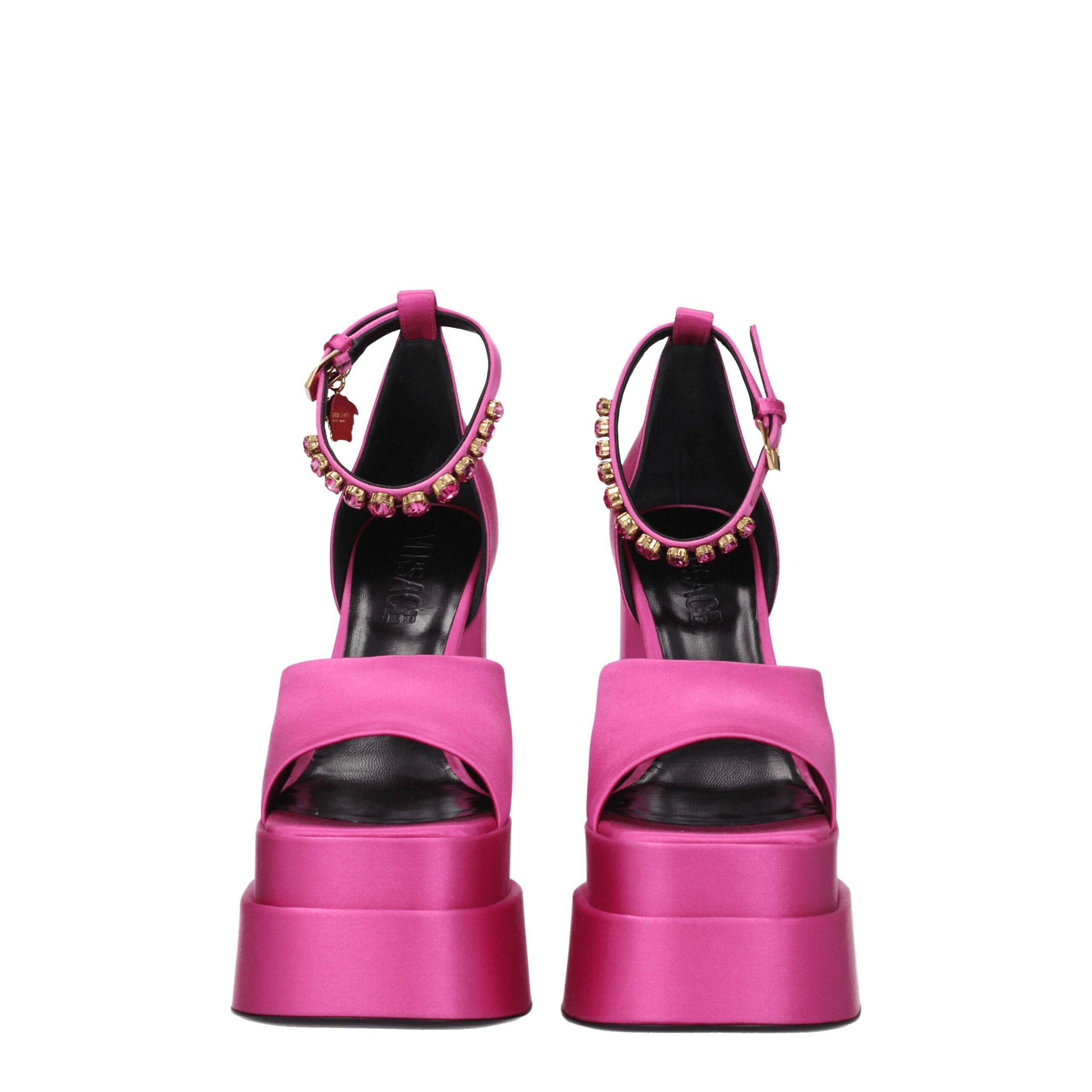 Pink Satin Platform SandalsDescription: The product with MPN 1007717DRA671PK4V and code F76783 satin in fuchsia is a sandals designed by Versace. It has features like side detail, rhinestone. Additional Info: Style: Casual Closing type: Buckle Closure Mat