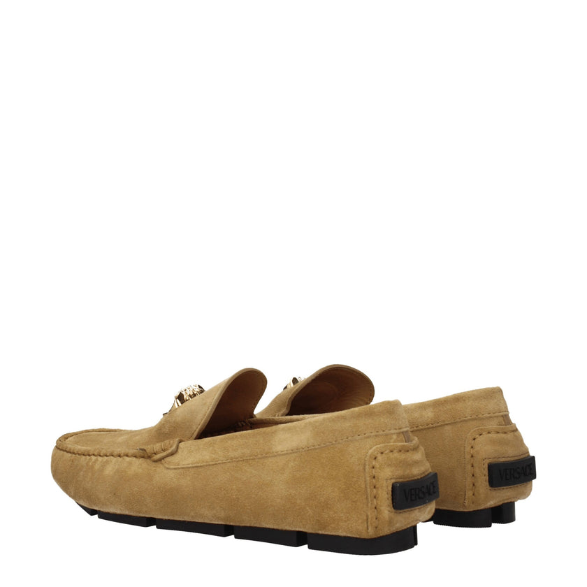 Beige Leather Slip-On LoafersDescription: The product with MPN 10037011A006341K78V and code F76790 suede in beige is a loafers designed by Versace. It has features like front logo. Additional Info: Color details: Gold Style: Casual Materials: Suede Shoe s