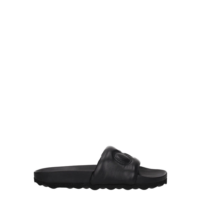 Black Leather SlippersDescription: The product with MPN OMIT001LEA0011010 and code F77104 leather in black is a slippers and clogs designed by Off-White. It has features like front logo. Additional Info: Style: Casual Materials: Leather Shoe sole: Rubber