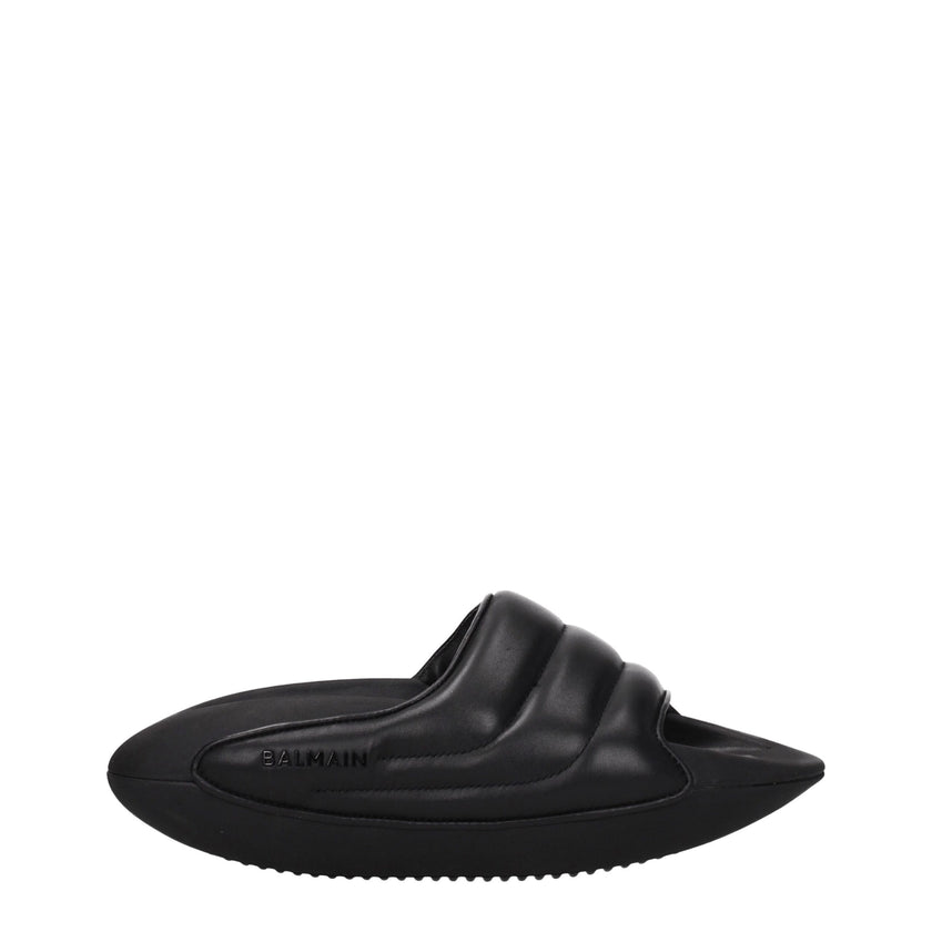 Black Leather SlippersDescription: The product with MPN VL299LPQP0PA and code F77106 leather in black is a slippers and clogs designed by Balmain. It has features like side logo. Additional Info: Style: Casual Materials: Leather Shoe sole: Rubber Heel hei