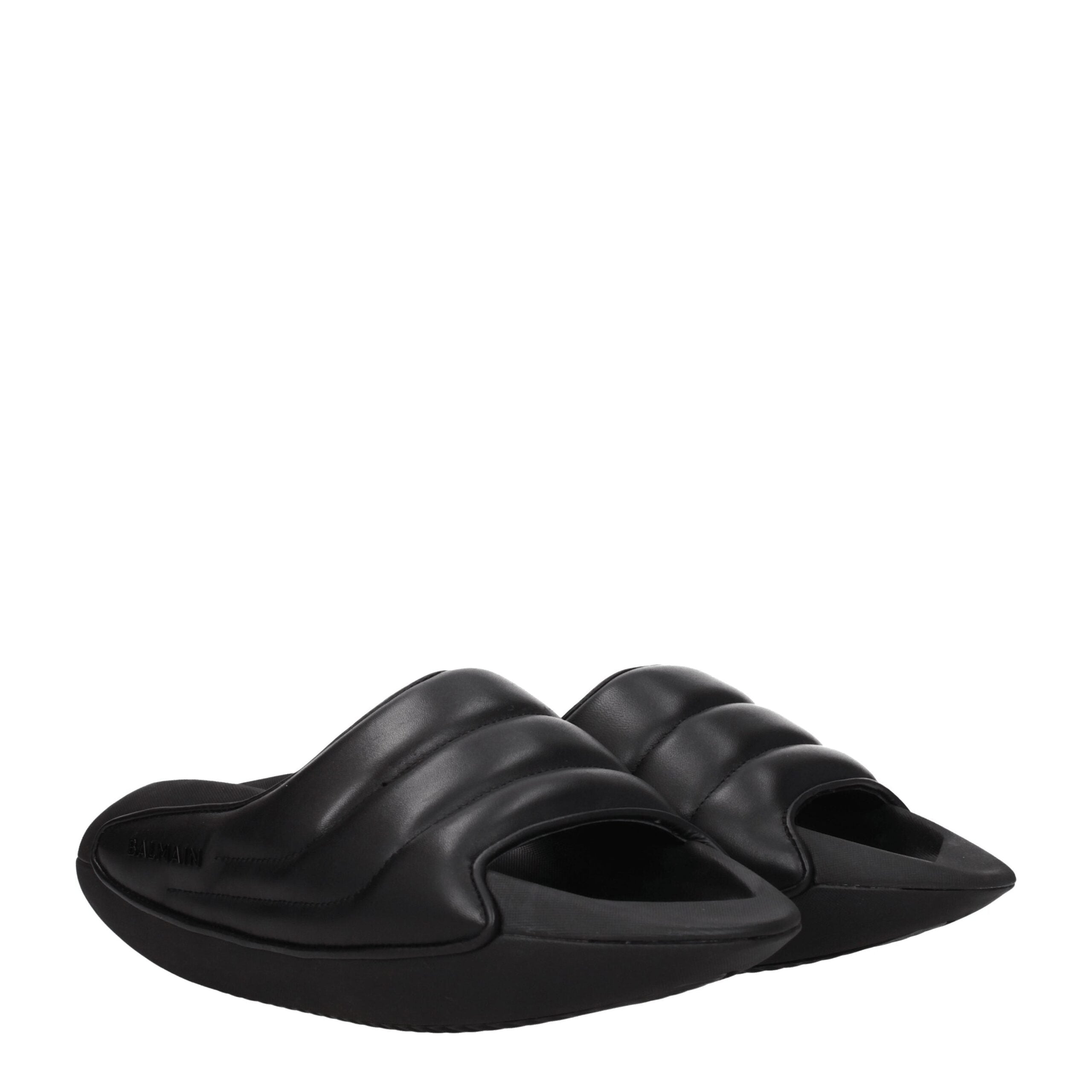 Black Leather SlippersDescription: The product with MPN VL299LPQP0PA and code F77106 leather in black is a slippers and clogs designed by Balmain. It has features like side logo. Additional Info: Style: Casual Materials: Leather Shoe sole: Rubber Heel hei