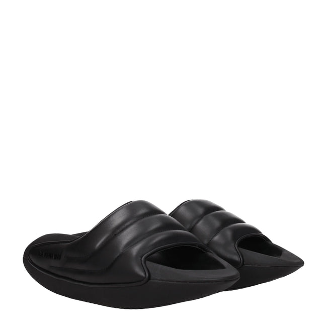 Black Leather SlippersDescription: The product with MPN VL299LPQP0PA and code F77106 leather in black is a slippers and clogs designed by Balmain. It has features like side logo. Additional Info: Style: Casual Materials: Leather Shoe sole: Rubber Heel hei