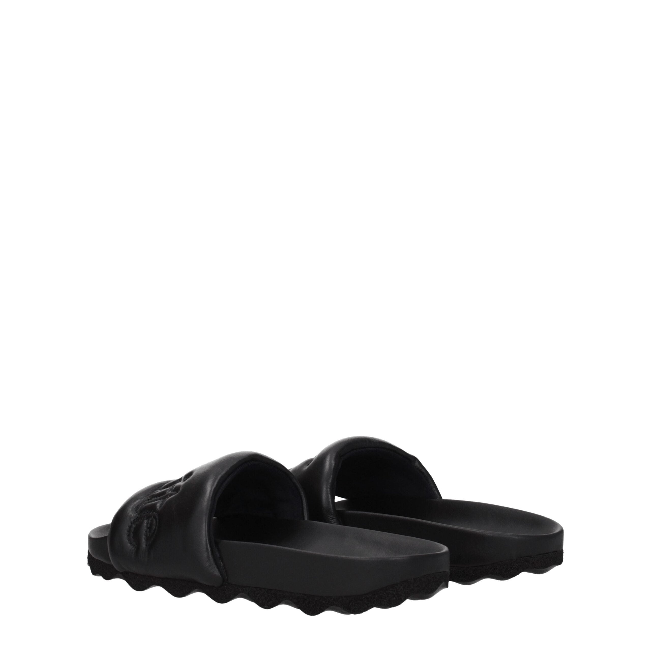 Black Leather SlippersDescription: The product with MPN OMIT001LEA0011010 and code F77104 leather in black is a slippers and clogs designed by Off-White. It has features like front logo. Additional Info: Style: Casual Materials: Leather Shoe sole: Rubber