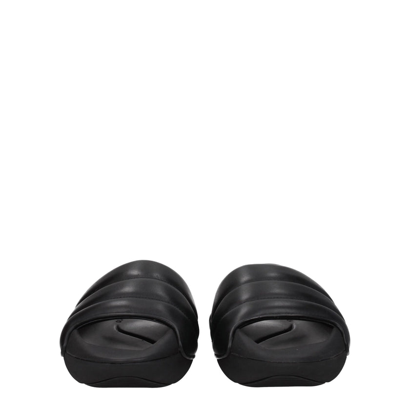 Black Leather SlippersDescription: The product with MPN VL299LPQP0PA and code F77106 leather in black is a slippers and clogs designed by Balmain. It has features like side logo. Additional Info: Style: Casual Materials: Leather Shoe sole: Rubber Heel hei
