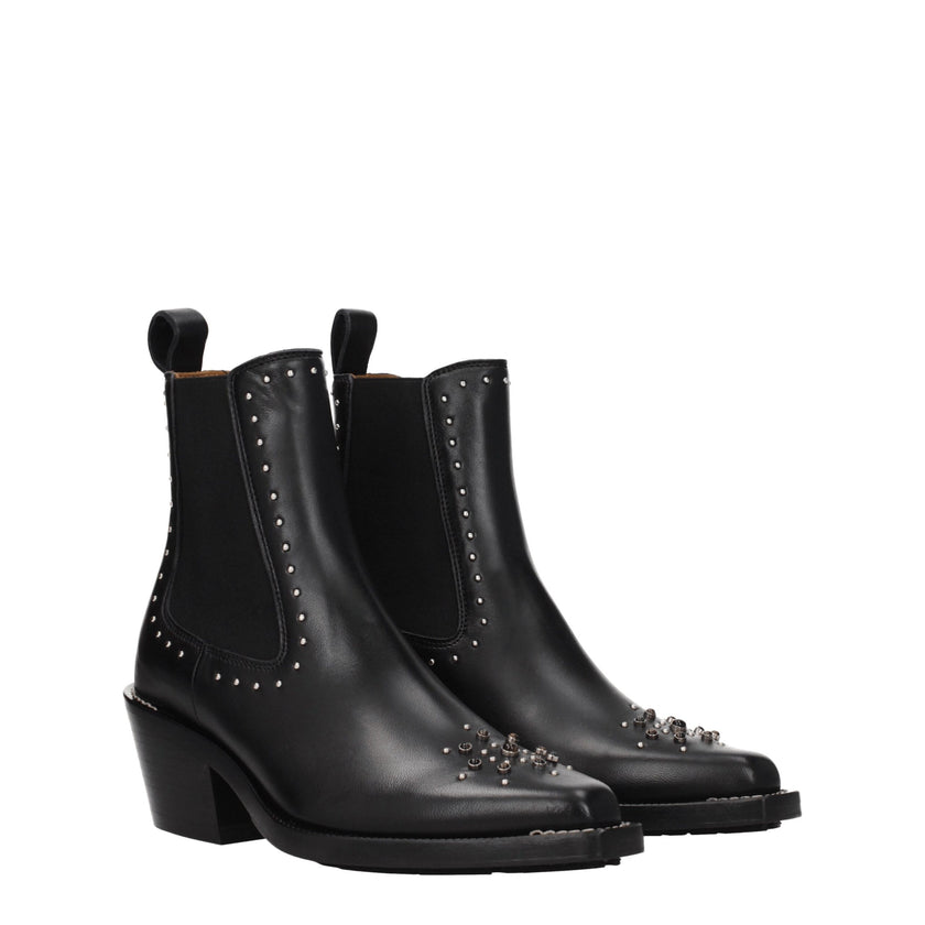 Black Leather Ankle BootsDescription: The product with MPN CHC22W705AV001 and code F77636 leather in black is a ankle boots designed by Chloé. It has features like studs, stones. Additional Info: Color details: Silver Style: Casual Materials: Leather Shoe