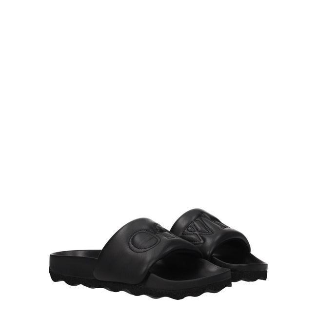 Black Leather SlippersDescription: The product with MPN OWIT001LEA0011010 and code F77847 leather in black is a slippers and clogs designed by Off-White. It has features like front logo. Additional Info: Style: Casual Materials: Leather Shoe sole: Rubber