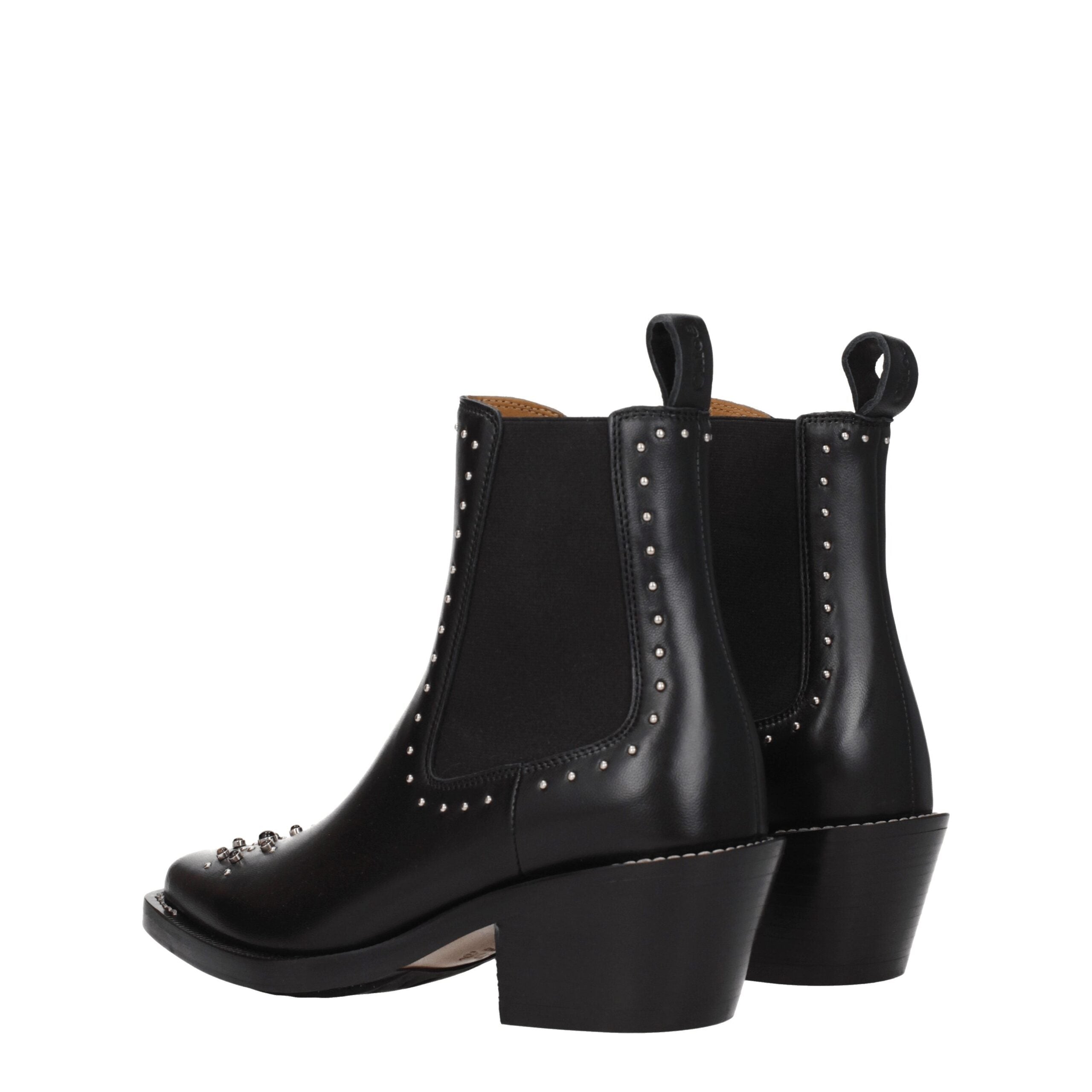 Black Leather Ankle BootsDescription: The product with MPN CHC22W705AV001 and code F77636 leather in black is a ankle boots designed by Chloé. It has features like studs, stones. Additional Info: Color details: Silver Style: Casual Materials: Leather Shoe