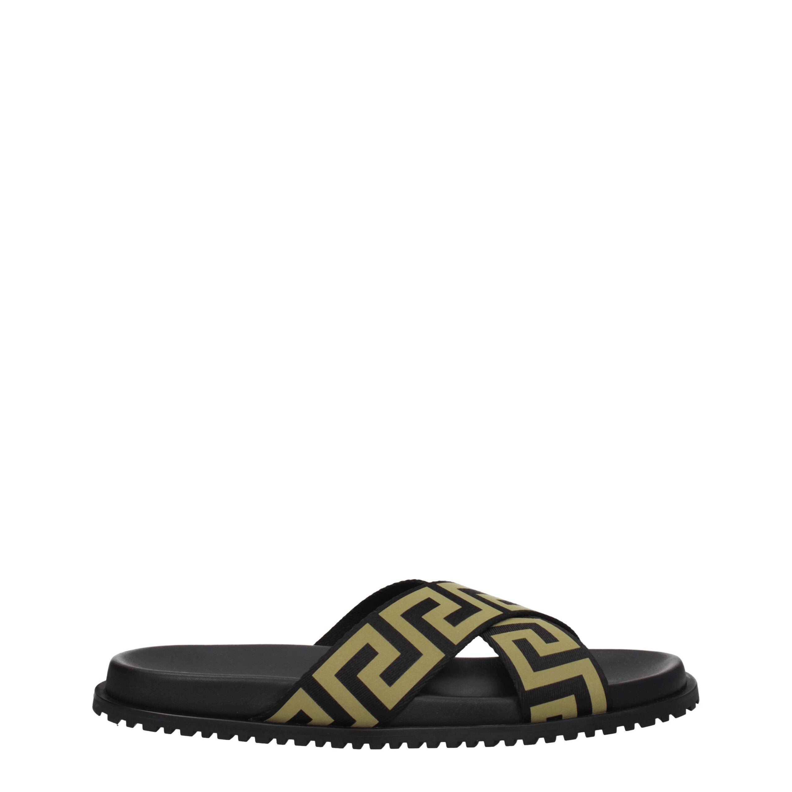 Black Fabric SlippersDescription: The product with MPN 10083181A059582B150 and code F76789 fabric in black is a slippers and clogs designed by Versace. Additional Info: Style: Casual Materials: Fabric Shoe sole: Rubber Shoe tip: Open toe Heel type: Low an