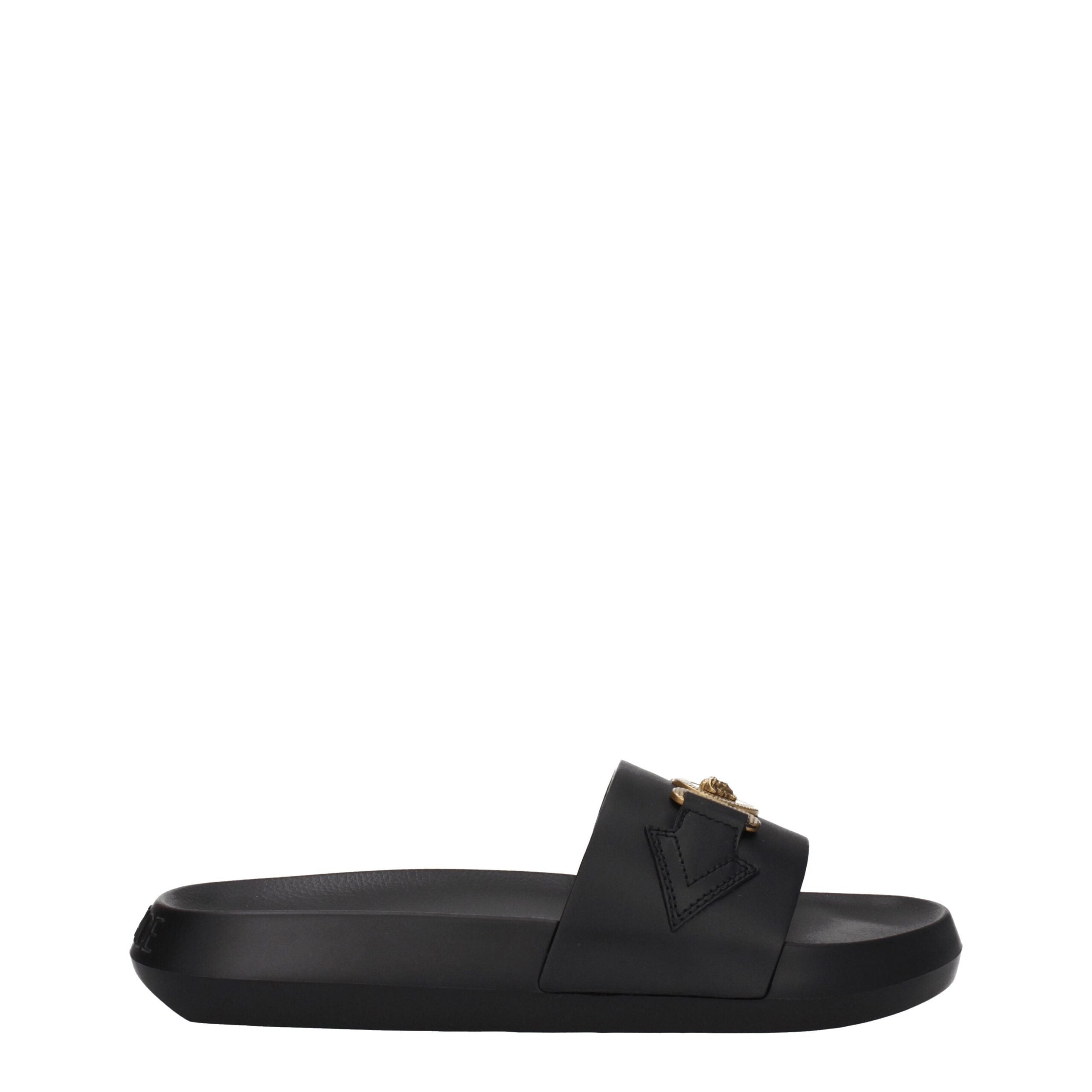 Black Leather SlippersDescription: The product with MPN 1010628DV46G1B00V and code F78140 leather in black is a slippers and clogs designed by Versace. It has features like back logo. Additional Info: Color details: Gold Style: Casual Materials: Leather S