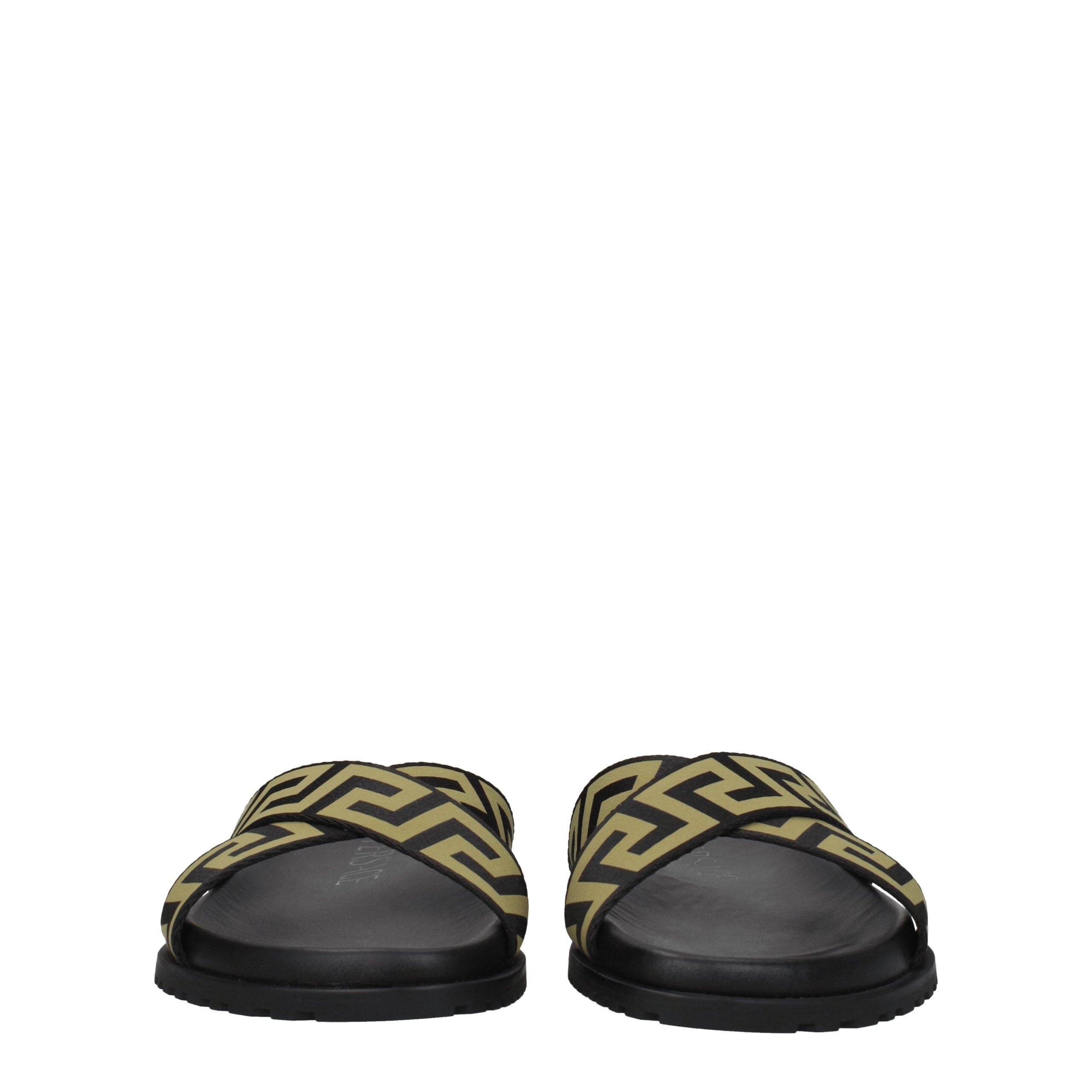 Black Fabric SlippersDescription: The product with MPN 10083181A059582B150 and code F76789 fabric in black is a slippers and clogs designed by Versace. Additional Info: Style: Casual Materials: Fabric Shoe sole: Rubber Shoe tip: Open toe Heel type: Low an