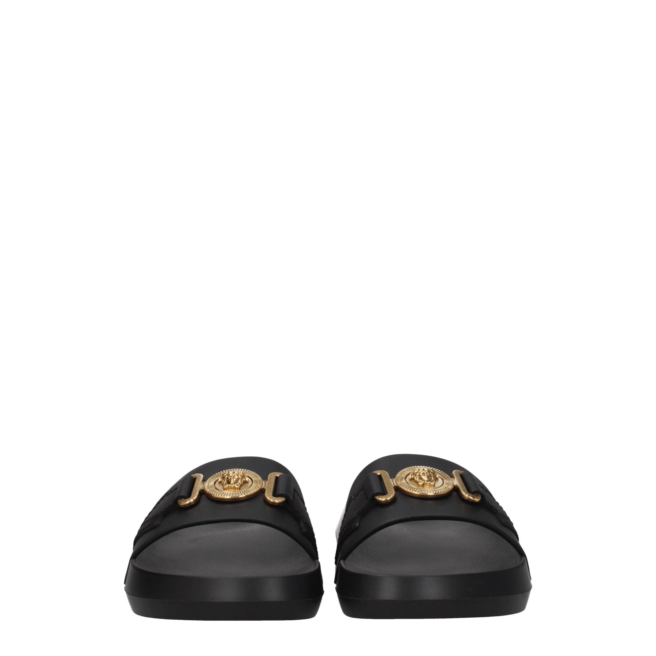 Black Leather SlippersDescription: The product with MPN 1011304DV46G1B00V and code F78143 leather in black is a slippers and clogs designed by Versace. It has features like front detail, back logo. Additional Info: Color details: Gold Style: Casual Materi