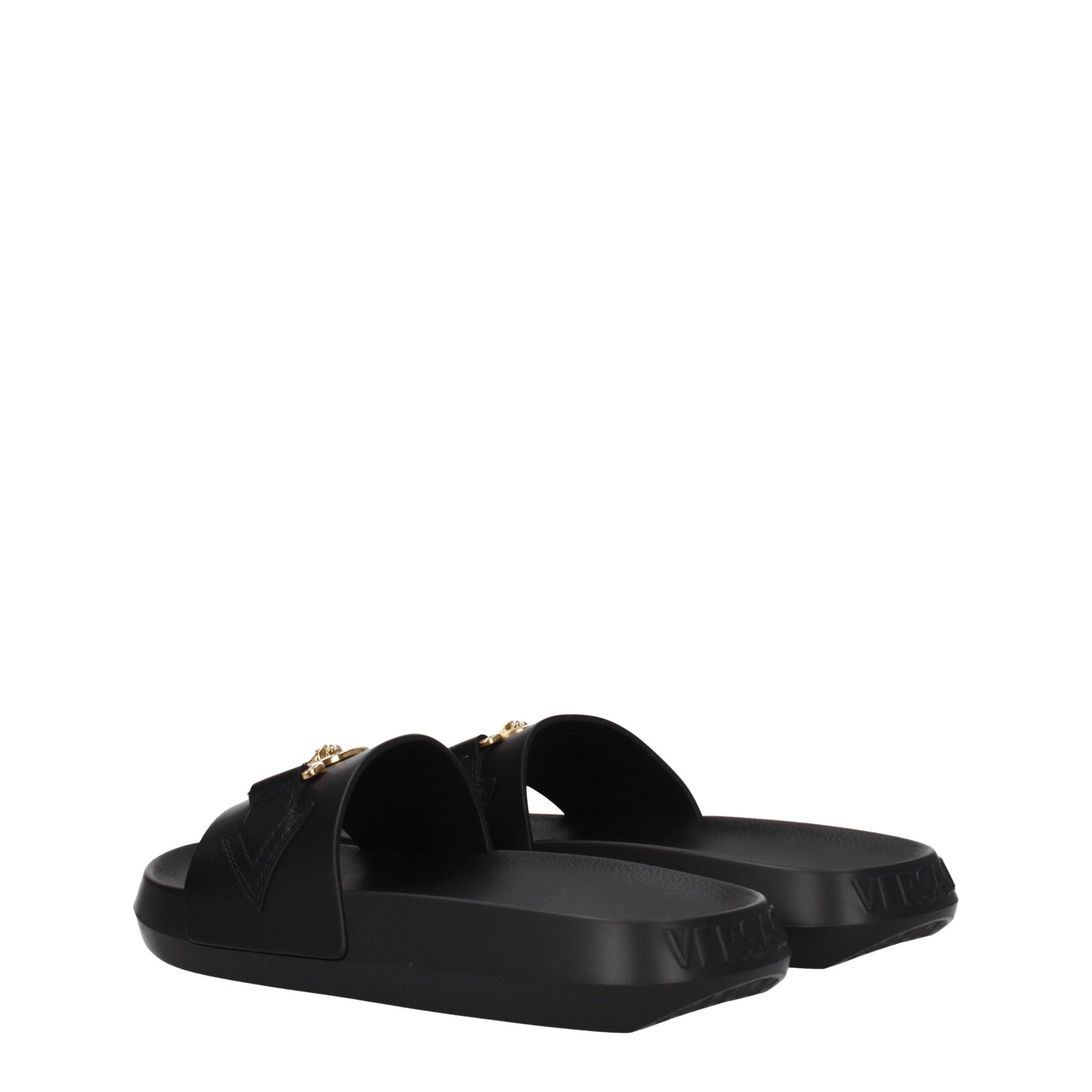 Black Leather SlippersDescription: The product with MPN 1011304DV46G1B00V and code F78143 leather in black is a slippers and clogs designed by Versace. It has features like front detail, back logo. Additional Info: Color details: Gold Style: Casual Materi
