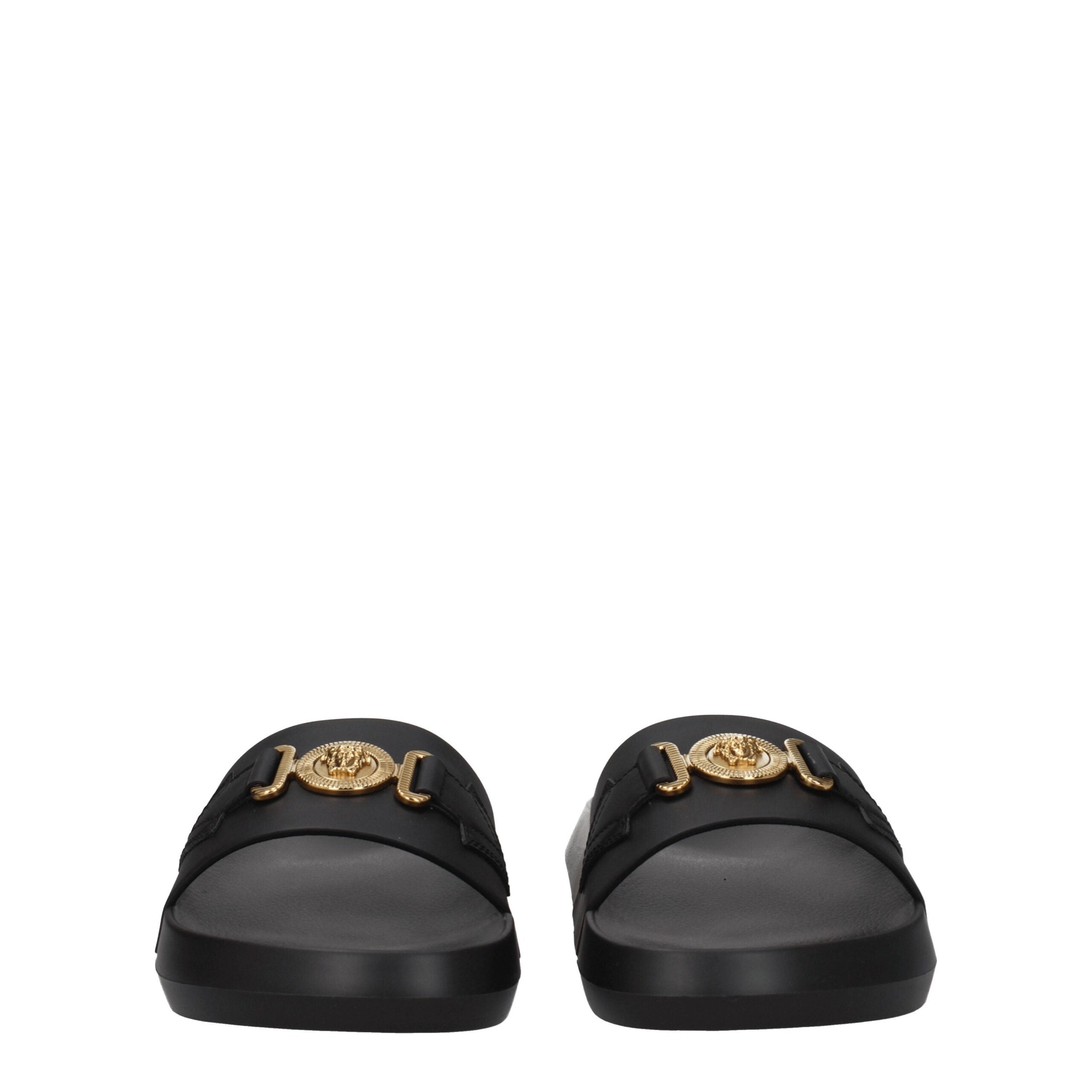 Black Leather SlippersDescription: The product with MPN 1010628DV46G1B00V and code F78140 leather in black is a slippers and clogs designed by Versace. It has features like back logo. Additional Info: Color details: Gold Style: Casual Materials: Leather S