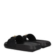 Black Leather SlippersDescription: The product with MPN 1010628DV46G1B00V and code F78140 leather in black is a slippers and clogs designed by Versace. It has features like back logo. Additional Info: Color details: Gold Style: Casual Materials: Leather S