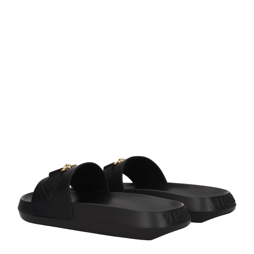 Black Leather SlippersDescription: The product with MPN 1010628DV46G1B00V and code F78140 leather in black is a slippers and clogs designed by Versace. It has features like back logo. Additional Info: Color details: Gold Style: Casual Materials: Leather S