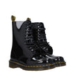 Black Leather Ankle BootsDescription: The product with MPN D1490MJ25005001 and code F78540 patent leather in black is a ankle boots designed by Dr. Martens. Additional Info: Style: Casual Closing type: Lace up Closure Materials: Patent Leather Shoe sole: