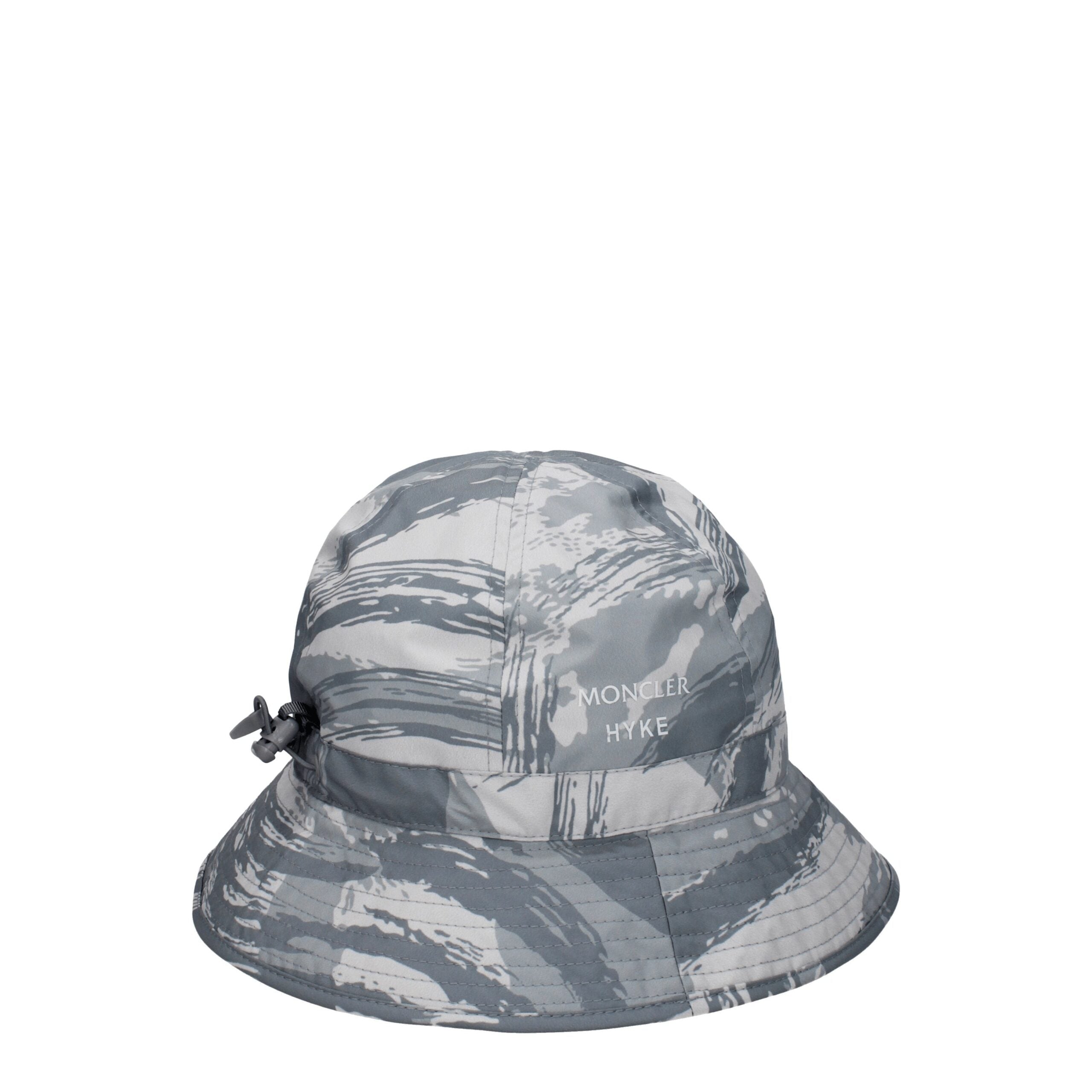 Gray Polyester Bucket HatDescription: The product with MPN 3B00001596I0F92 and code F78991 polyester in gray is a hats designed by Moncler. It has features like front logo. Additional Info: Style: Sporty Glam Closing type: Drawstring Closure Materials: Po