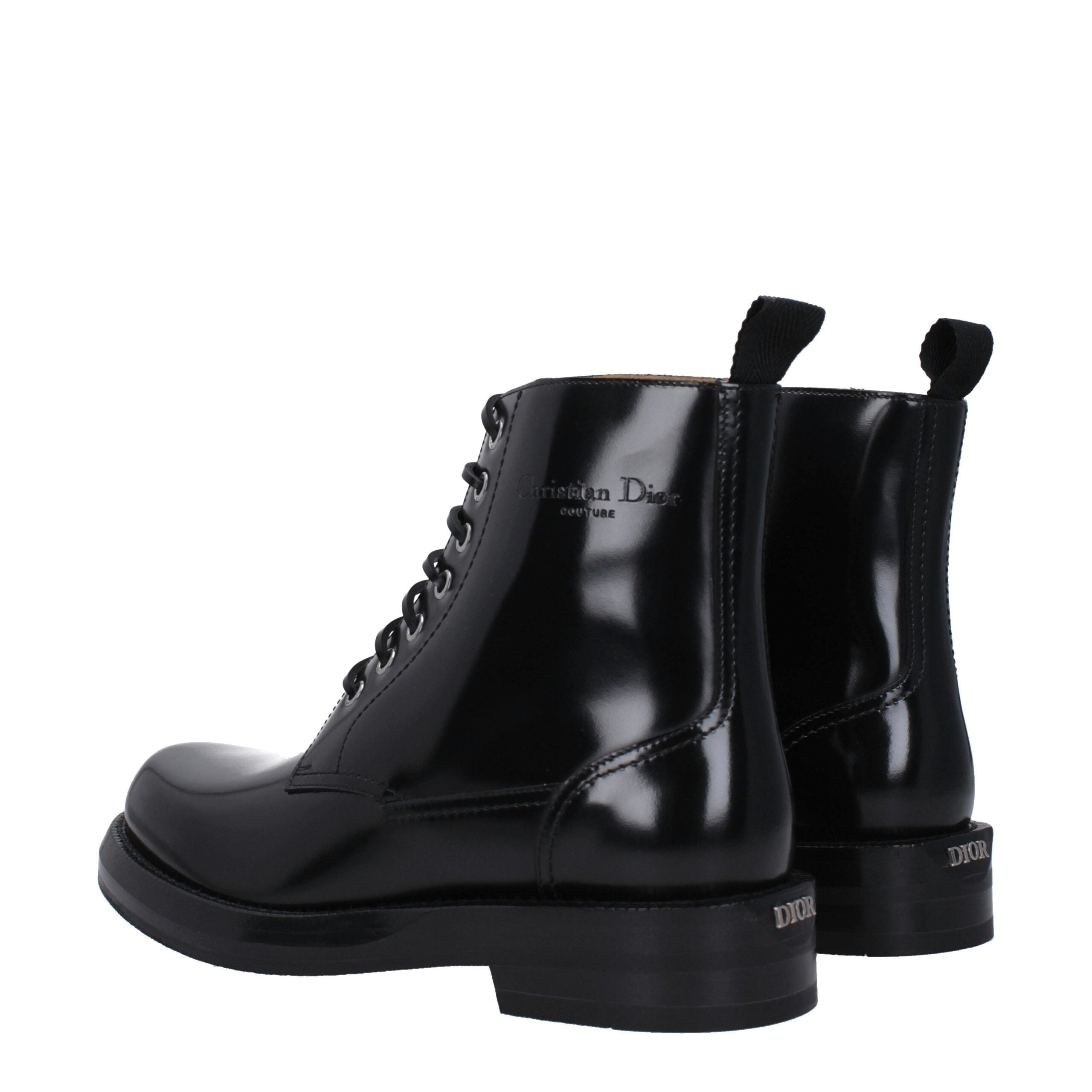 Black Leather Ankle BootsDescription: The product with MPN 3BO305ZJQ969 and code F79019 leather in black is a ankle boots designed by Christian Dior. It has features like side logo, back logo. Additional Info: Style: Casual Closing type: Lace up Closure M