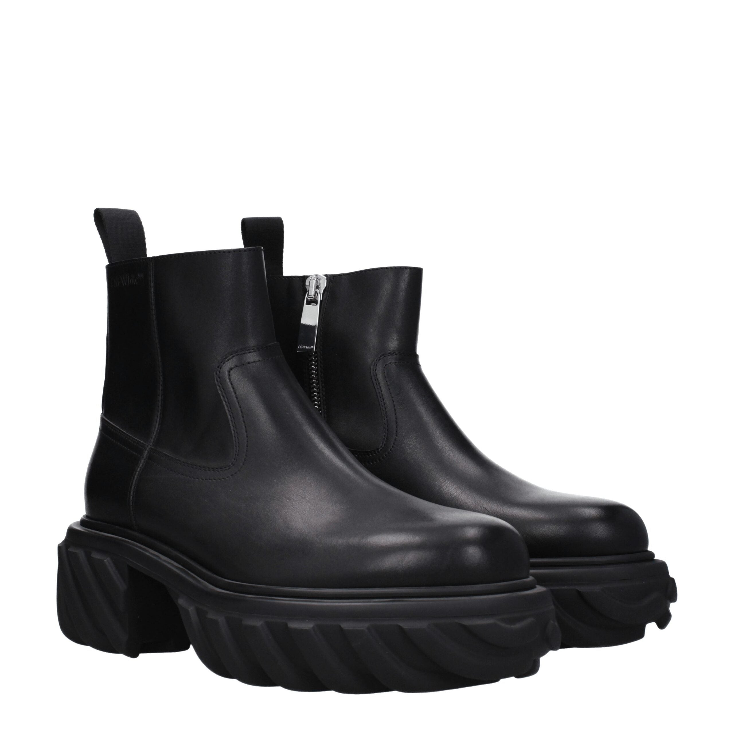 Black Leather Ankle BootsDescription: The product with MPN OMID029LEA0011010 and code F79083 leather in black is a ankle boots designed by Off-White. It has features like side logo. Additional Info: Style: Casual Closing type: Zip Closure Materials: Leath