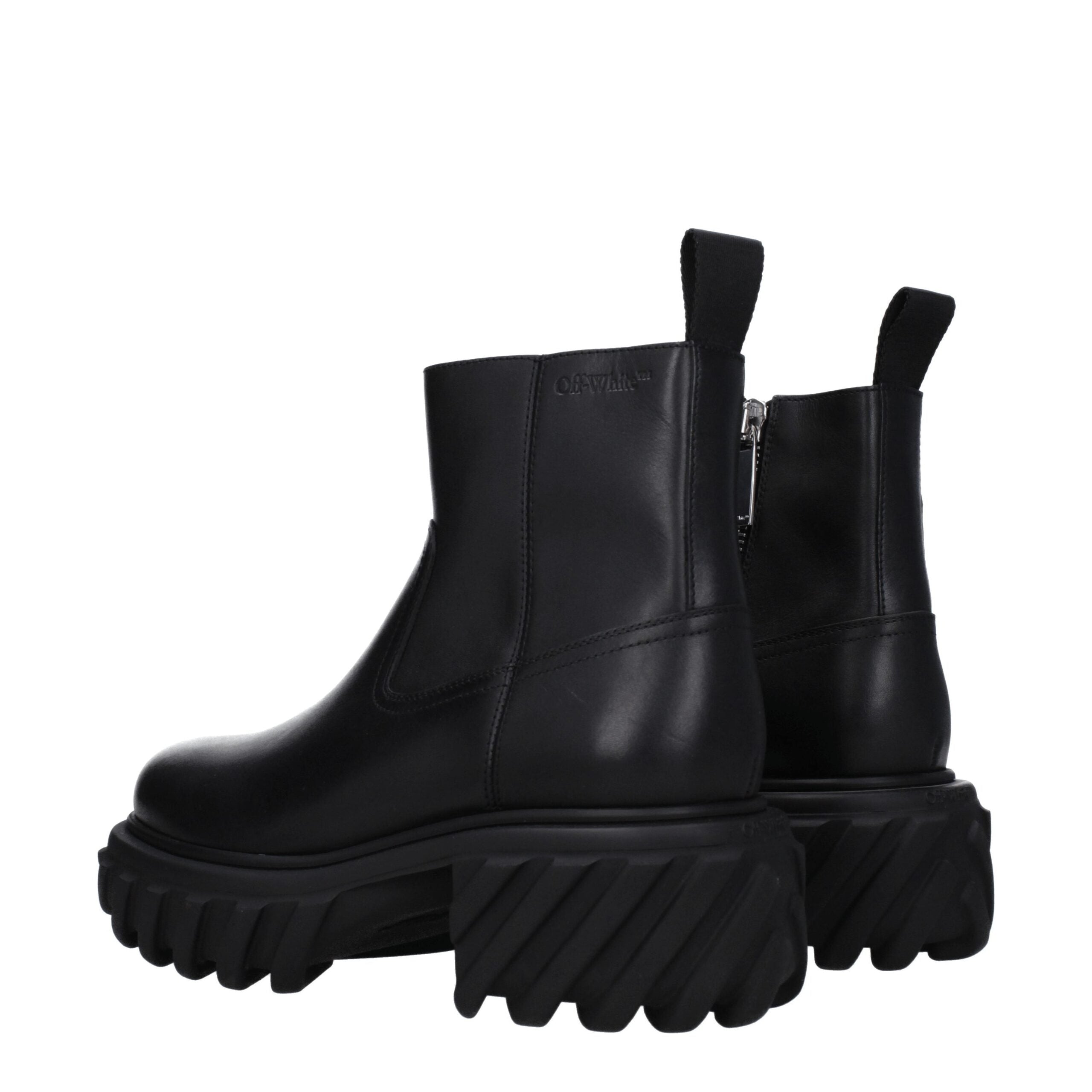 Black Leather Ankle BootsDescription: The product with MPN OMID029LEA0011010 and code F79083 leather in black is a ankle boots designed by Off-White. It has features like side logo. Additional Info: Style: Casual Closing type: Zip Closure Materials: Leath