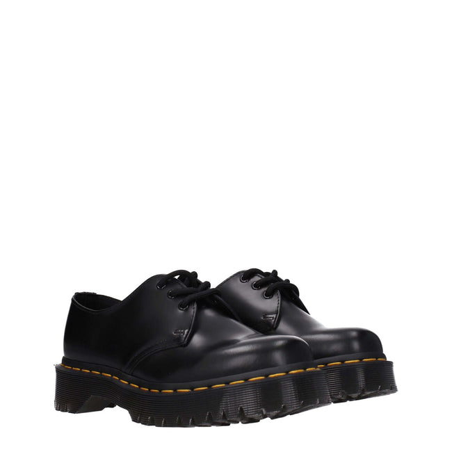 Black Leather Oxfords And DerbiesDescription: The product with MPN D1461BEX21084001 and code F79197 leather in black is a lace up and monkstrap designed by Dr. Martens. Additional Info: Style: Casual Closing type: Lace up Closure Materials: Leather Shoe s