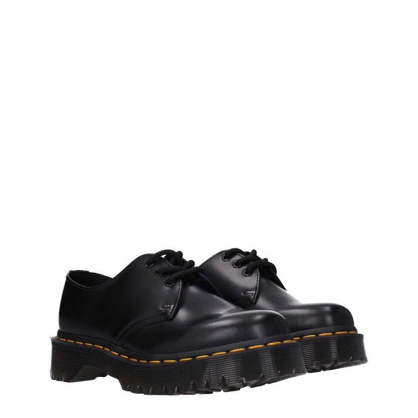 Black Leather Oxfords And DerbiesDescription: The product with MPN D1461BEX21084001 and code F79197 leather in black is a lace up and monkstrap designed by Dr. Martens. Additional Info: Style: Casual Closing type: Lace up Closure Materials: Leather Shoe s