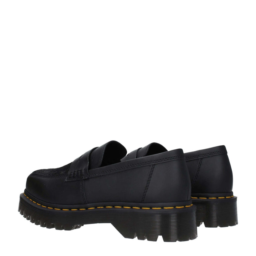 Black Leather Slip-On LoafersDescription: The product with MPN UPENTONBEXSQPNY31303001 and code F79202 leather in black is a loafers designed by Dr. Martens. Additional Info: Style: Casual Materials: Leather Shoe sole: Rubber Heel height: 3.5 cm Shoe tip:
