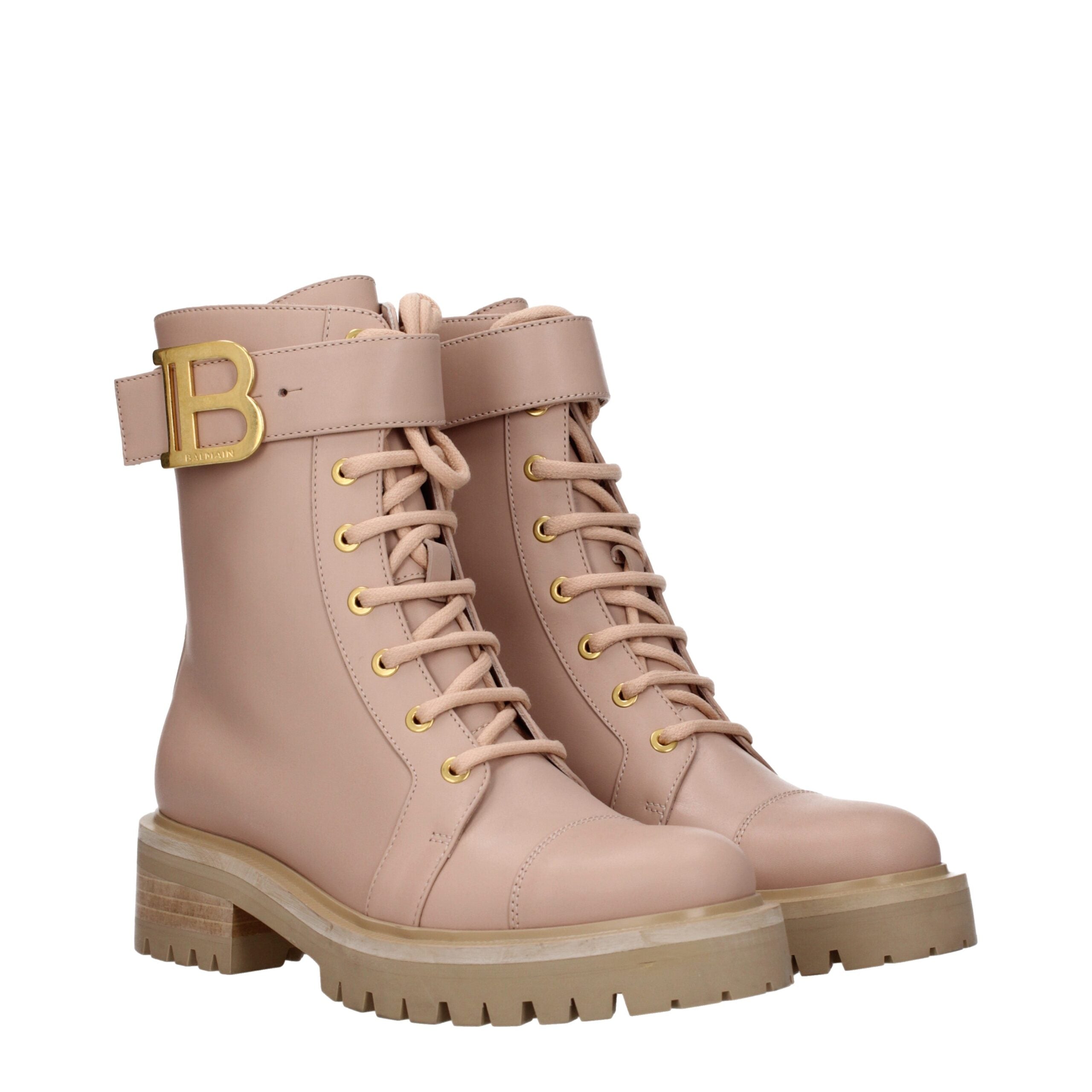 Beige Leather Ankle BootsDescription: The product with MPN TC502LVTO0AP and code F79700 leather in beige is a ankle boots designed by Balmain. It has features like side logo. Additional Info: Style: Sporty Glam Closing type: Lace up Closure Materials: Lea