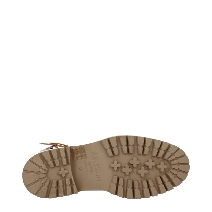 Beige Leather Ankle BootsDescription: The product with MPN TC502LVTO0AP and code F79700 leather in beige is a ankle boots designed by Balmain. It has features like side logo. Additional Info: Style: Sporty Glam Closing type: Lace up Closure Materials: Lea