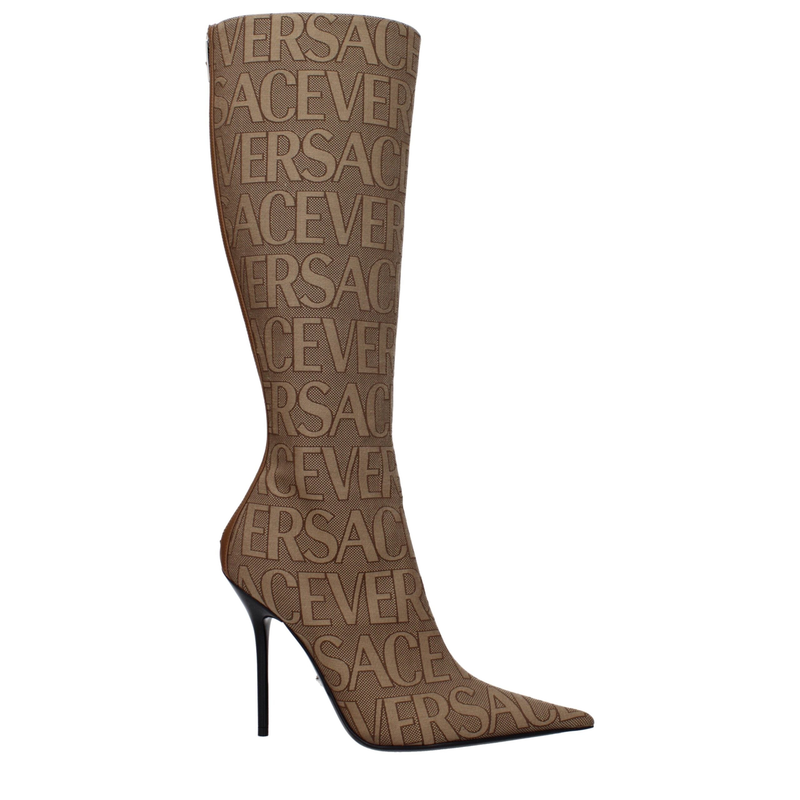 Beige Fabric High Heel BootsDescription: The product with MPN 10113981A079772N24P and code F80012 fabric in beige is a boots designed by Versace. It has features like logo. Additional Info: Style: Casual Closing type: Zip Closure Materials: Fabric Shoe so