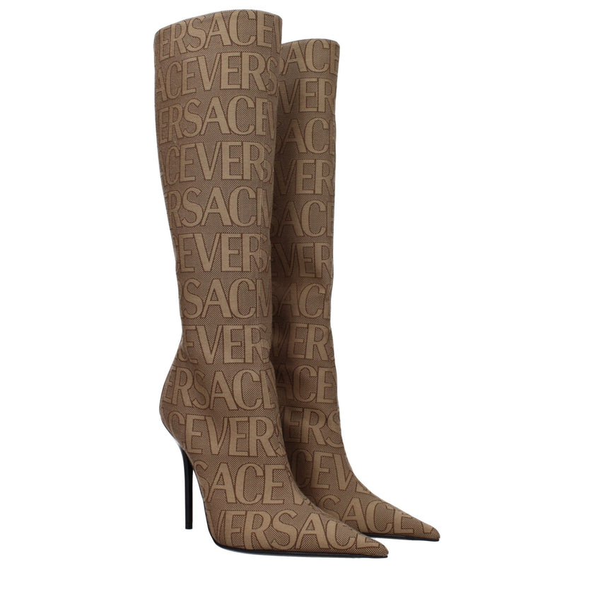 Beige Fabric High Heel BootsDescription: The product with MPN 10113981A079772N24P and code F80012 fabric in beige is a boots designed by Versace. It has features like logo. Additional Info: Style: Casual Closing type: Zip Closure Materials: Fabric Shoe so