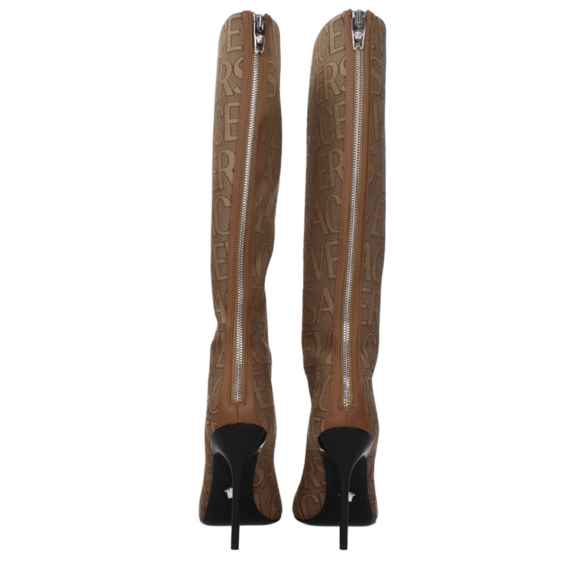 Beige Fabric High Heel BootsDescription: The product with MPN 10113981A079772N24P and code F80012 fabric in beige is a boots designed by Versace. It has features like logo. Additional Info: Style: Casual Closing type: Zip Closure Materials: Fabric Shoe so