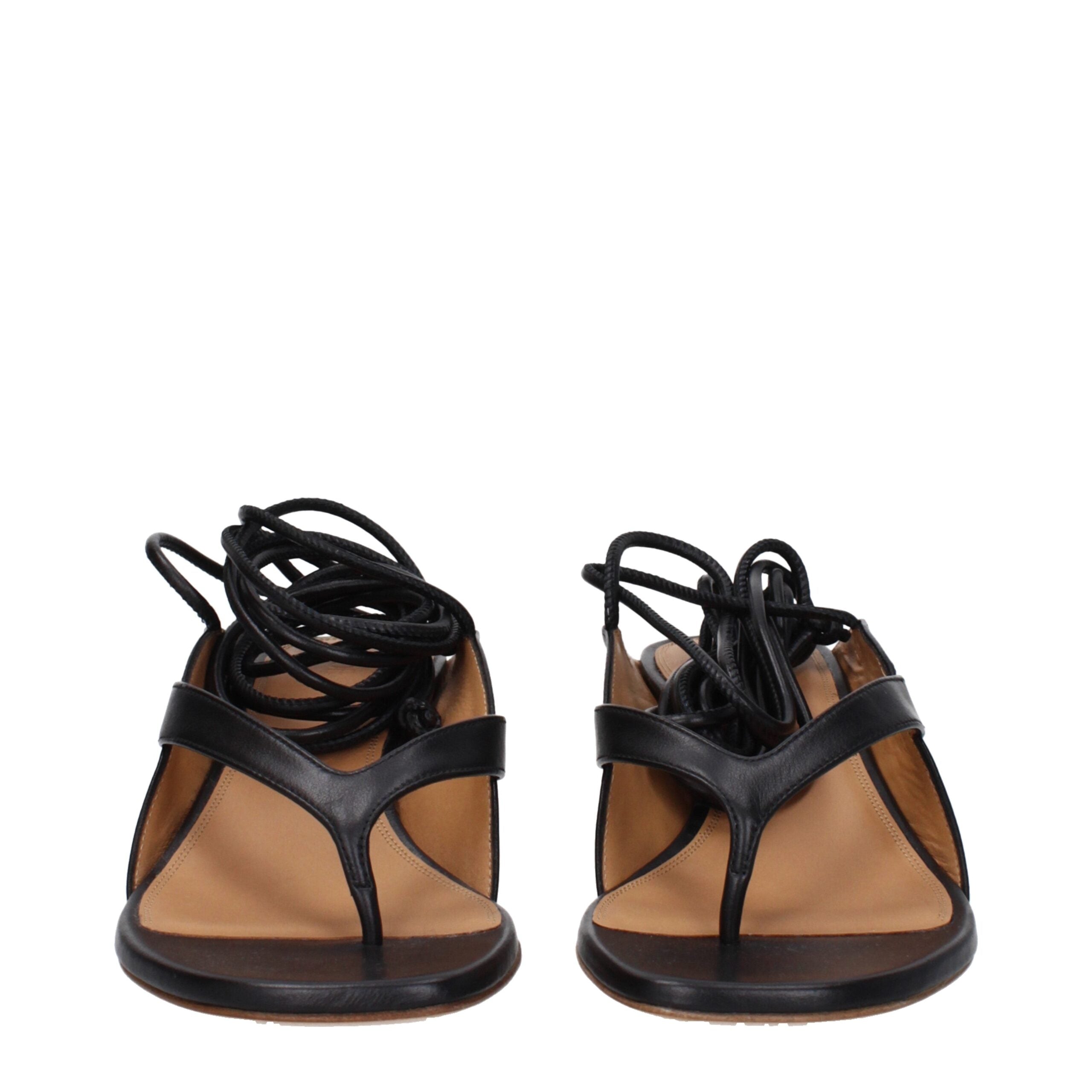 Black Leather Flip-Flop SandalsDescription: The product with MPN OWIH057LEA0011009 and code F80830 leather in black is a flip flops designed by Off-White. It has features like self tie closure. Additional Info: Closing type: Self tie Closures Shoe sole: L