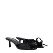 Black Leather SandalsDescription: The product with MPN 1XX6913LOC055F0002 and code F80994 patent leather in black is a sandals designed by Prada. It has features like front detail. Additional Info: Style: Casual Shoe sole: Leather Heel height: 5.5 cm Shoe