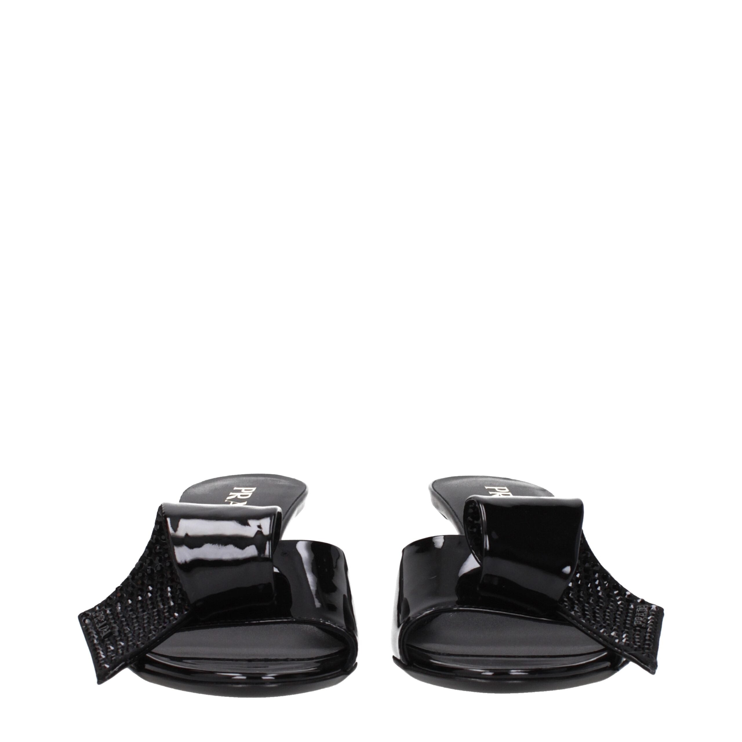 Black Leather SandalsDescription: The product with MPN 1XX6913LOC055F0002 and code F80994 patent leather in black is a sandals designed by Prada. It has features like front detail. Additional Info: Style: Casual Shoe sole: Leather Heel height: 5.5 cm Shoe