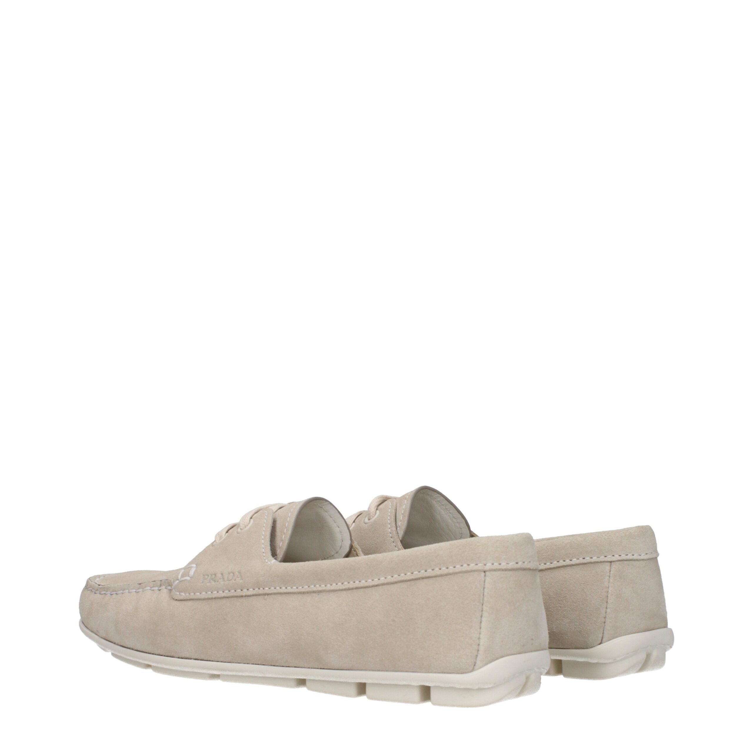 Graue Leder-Slipper mit seitlichem Logo