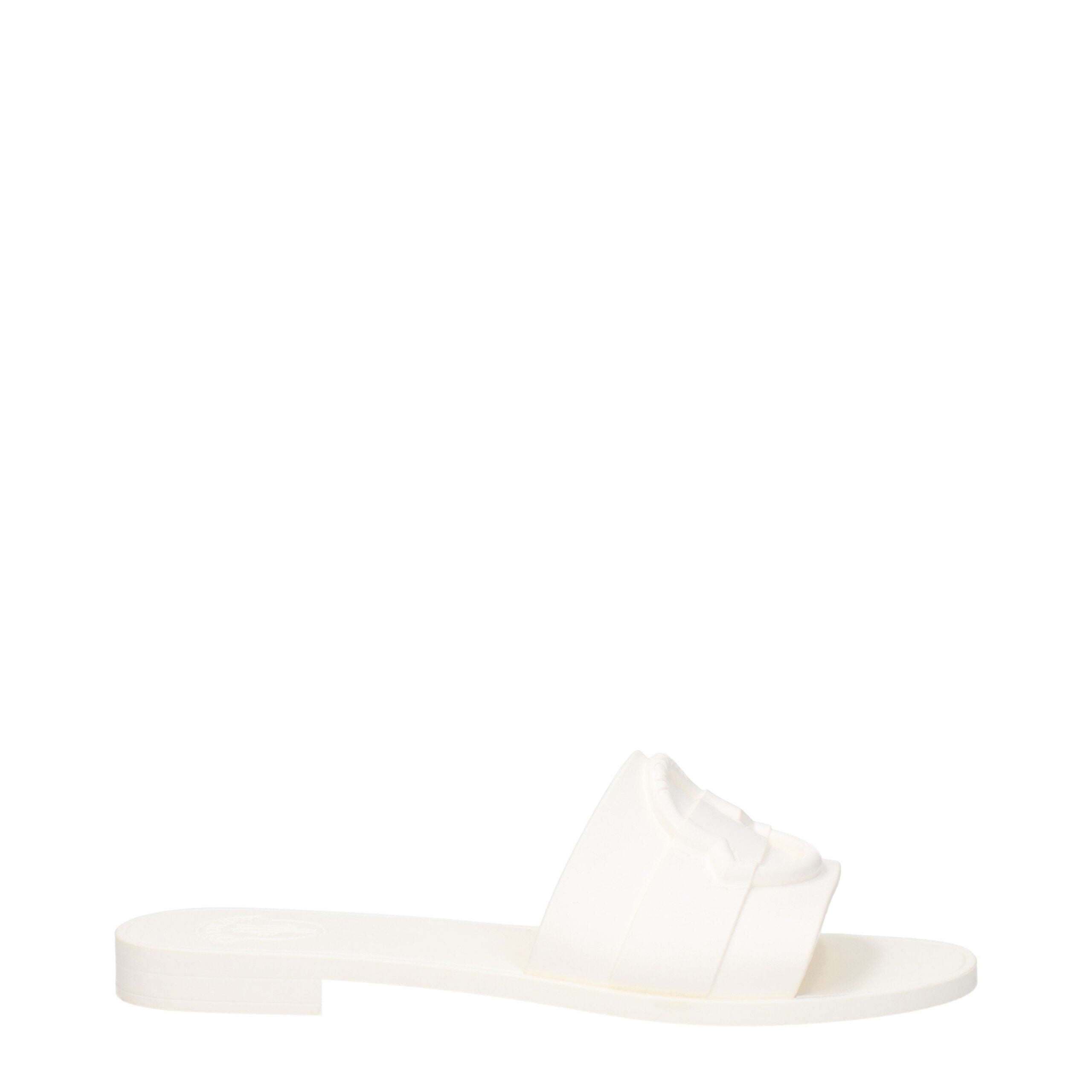 White Cotton SlippersDescription: The product with MPN 4C00130M4095035 and code F81209 rubber in white is a slippers and clogs designed by Moncler. It has features like front logo. Additional Info: Shoe sole: Rubber Shoe tip: Open toe Heel type: Low and f