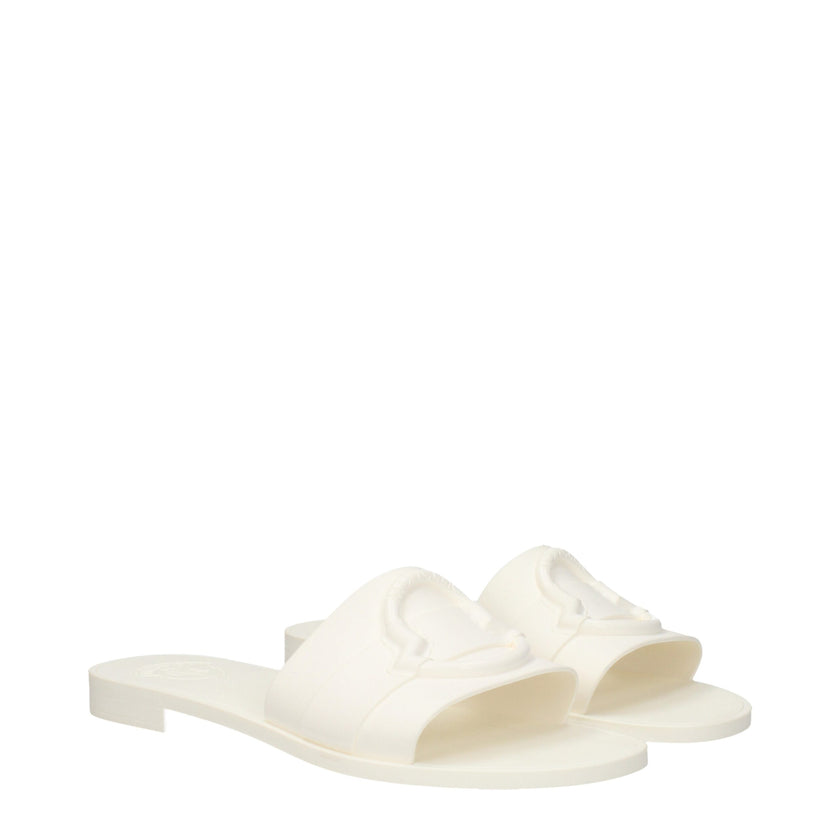 White Cotton SlippersDescription: The product with MPN 4C00130M4095035 and code F81209 rubber in white is a slippers and clogs designed by Moncler. It has features like front logo. Additional Info: Shoe sole: Rubber Shoe tip: Open toe Heel type: Low and f