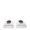 White Cotton SlippersDescription: The product with MPN FE52MU110P5102 and code F81417 rubber in white is a slippers and clogs designed by Kenzo. It has features like front logo. Additional Info: Style: Casual Shoe sole: Rubber Shoe tip: Open toe Heel type