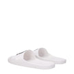 White Cotton SlippersDescription: The product with MPN FE52MU110P5102 and code F81417 rubber in white is a slippers and clogs designed by Kenzo. It has features like front logo. Additional Info: Style: Casual Shoe sole: Rubber Shoe tip: Open toe Heel type