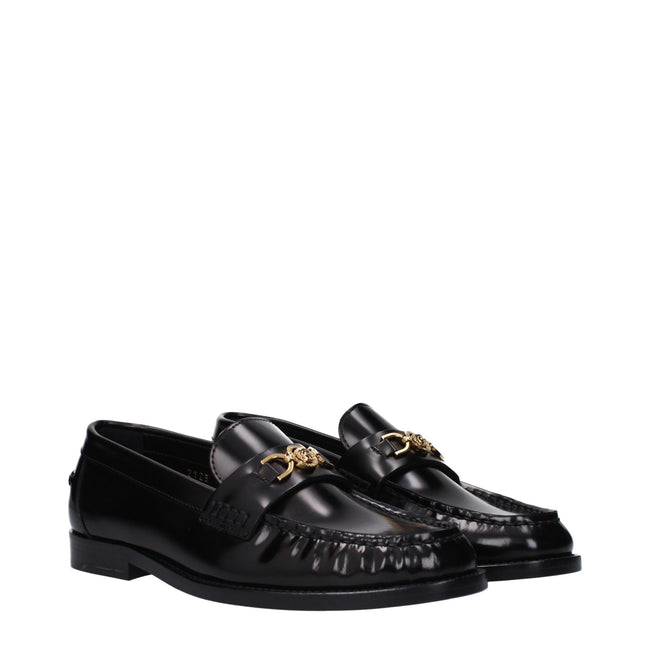 Black Leather Slip-On LoafersDescription: The product with MPN 10121231A087731B00V and code F82515 leather in black is a loafers designed by Versace. It has features like front detail, front logo. Additional Info: Style: Casual Shoe sole: Leather Shoe tip