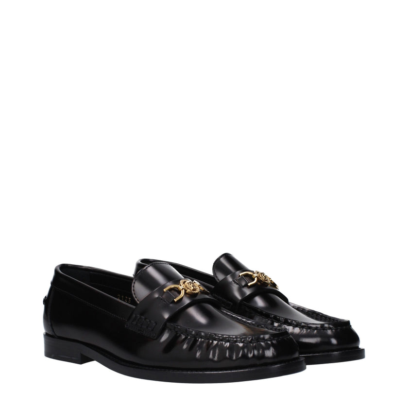 Black Leather Slip-On LoafersDescription: The product with MPN 10121231A087731B00V and code F82515 leather in black is a loafers designed by Versace. It has features like front detail, front logo. Additional Info: Style: Casual Shoe sole: Leather Shoe tip