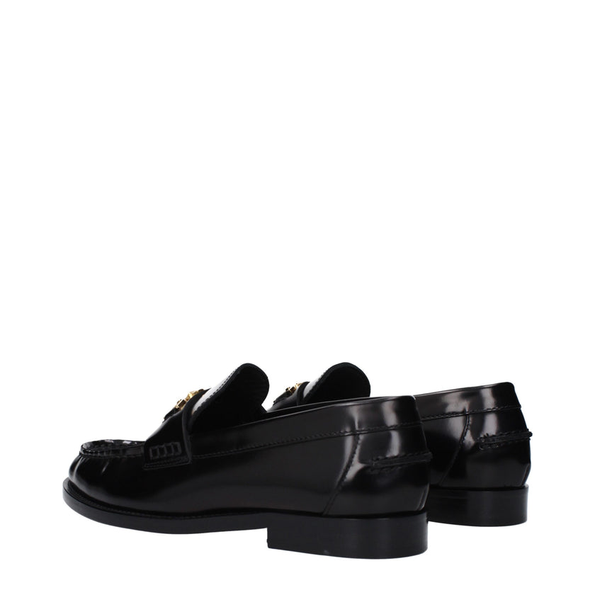 Black Leather Slip-On LoafersDescription: The product with MPN 10121231A087731B00V and code F82515 leather in black is a loafers designed by Versace. It has features like front detail, front logo. Additional Info: Style: Casual Shoe sole: Leather Shoe tip